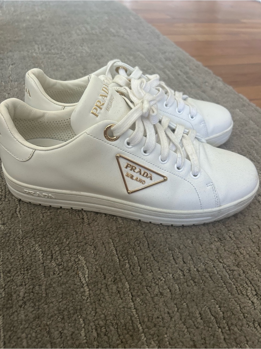 Prada White Leather Sneakers with Gold Logo Accents